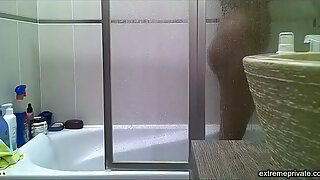 Curvy indian stepmom spied in the shower